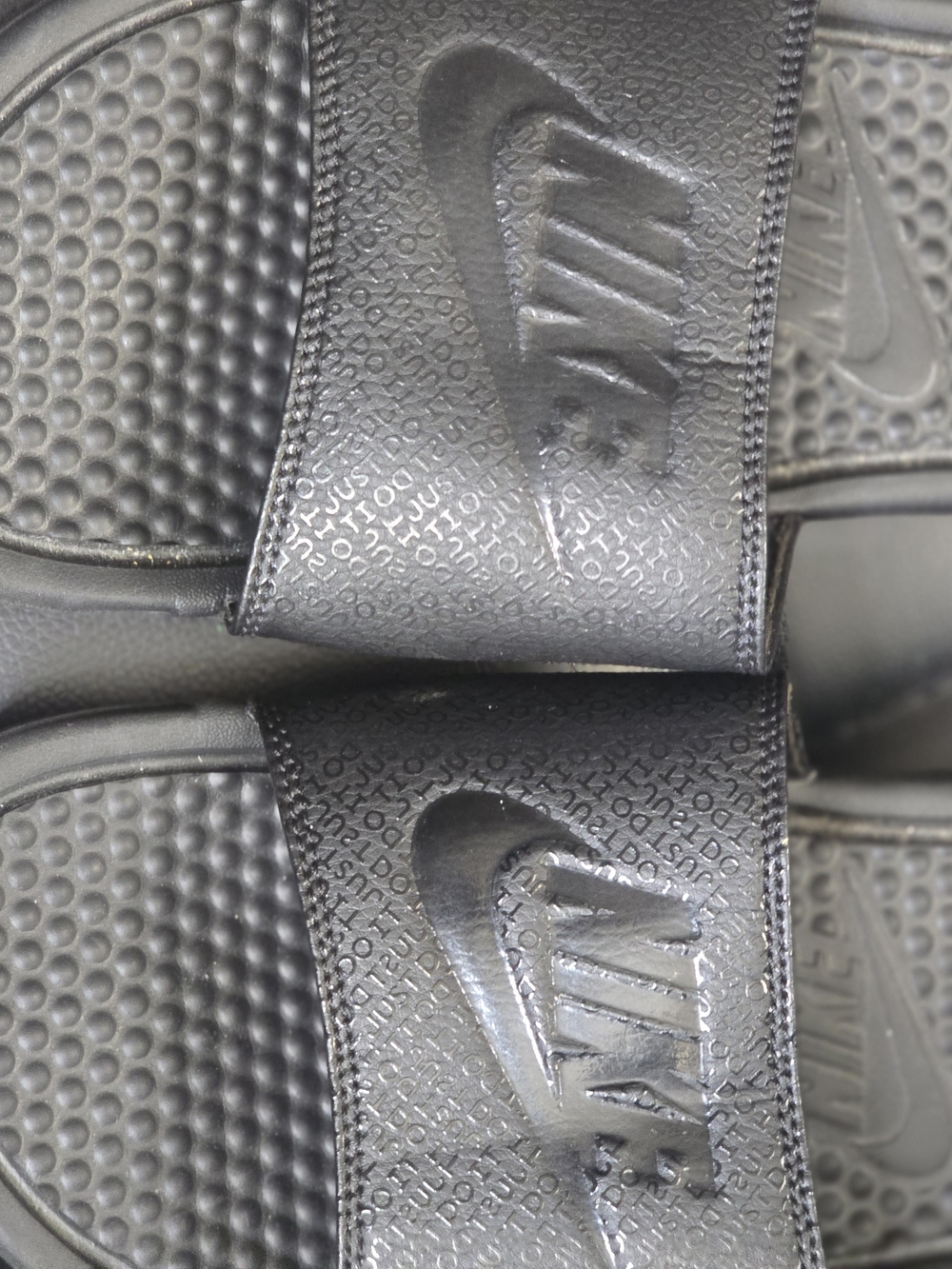 Nike Black Women’s Slide Sandals with Embossed Logo